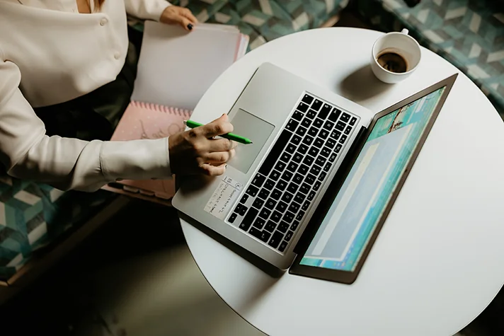 writer working on a macbook